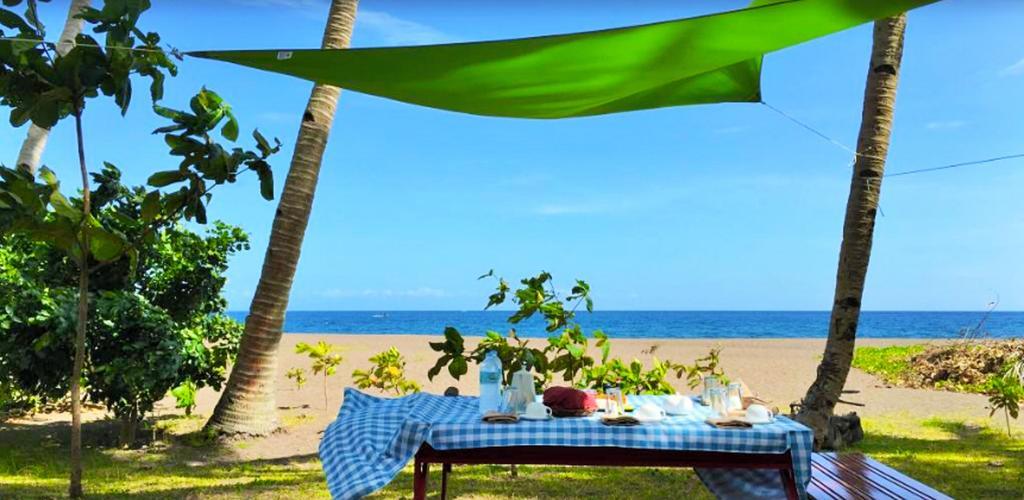 Somewhere Else Boutique Resort Мамбахао Экстерьер фото
