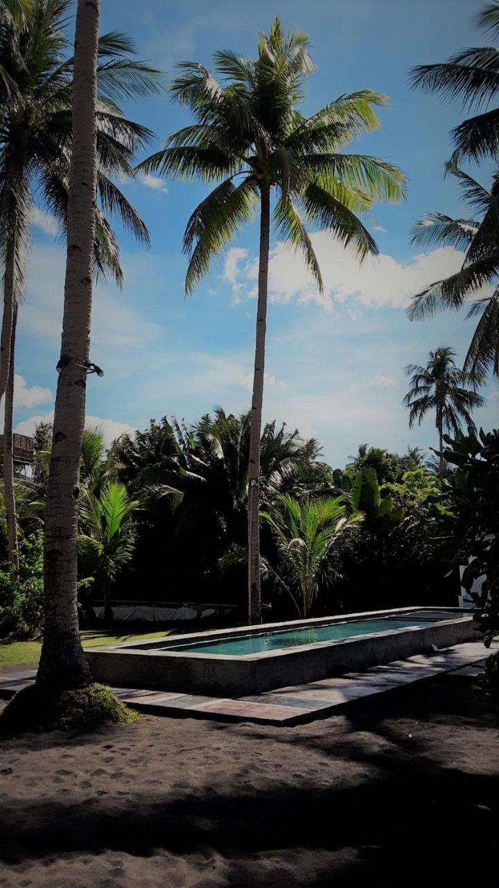 Somewhere Else Boutique Resort Мамбахао Экстерьер фото